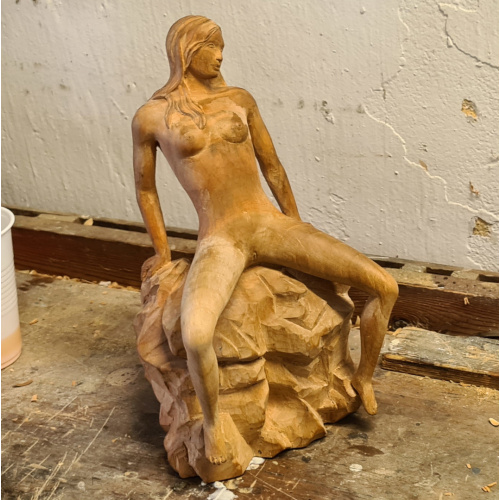 carved erotic statue